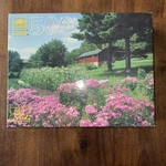 Golden Guild 500 Pc Puzzle Wisconsin Garden 1984 Purple Flowers Barn New Sealed. Fixed Price $12.00.