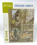 Pomegranate Edward Gorey's Frawgge Mfrg. Co. 1000 Piece Puzzle Delightful!. Fixed Price $24.99.