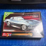 Wrebbit - 3D 1963 Corvette Sting Ray Puzzle New, Box Has Damage. Fixed Price $35.00.