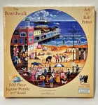 Sunsout The Boardwalk Round Puzzle Bob Pettes 500 Jigsaw New / Sealed. Fixed Price $22.00.