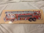 2002 Hook And Ladder Fire Truck By Shure 24 Pc Wooden Pull-out Puzzle Kids. Fixed Price $10.00.