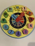 Euc Melissa & Doug Wooden Sorting Clock Puzzle Teach Time, Shapes, Colors. Fixed Price $9.99.