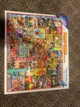 White Mountain Penny Candy 550 Piece Puzzle By Lois B. Sutton. Fixed Price $15.99.