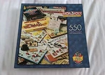 Monopoly Through Years 550 Piece Puzzle Pewter Token Parker Brothers 1998. Fixed Price $19.99.