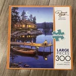 Buffalo Games Crescent Moon Bay Art By Darrell Bush 300 Large Piece Cabin Puzzle. Fixed Price $8.99.