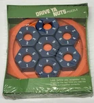 Vintage 1980 Milton Bradley Drive Ya Nuts Puzzle Brain Teaser Game Sealed. Fixed Price $28.00.