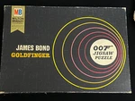 Vintage Milton Bradley James Bond 007 Goldfinger Jigsaw Puzzle 5617 - 1965. Fixed Price $30.00.