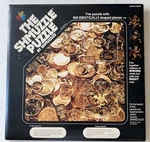 1980 The Shmuzzle Puzzle 168 Identically Shaped Pieces Gold Coins. Fixed Price $13.00.