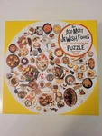 Artisan Puzzles 500 Piece Circular Jigsaw The 100 Most Jewish Foods. Fixed Price $10.00.