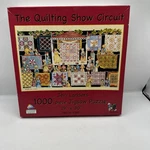 The Quilting Show Circuit Jeri Landers Jigsaw Puzzle 19 X 30 1000 Pieces Sunsout. Fixed Price $13.58.