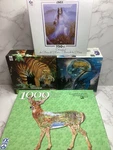 Lot 4 Jigsaw Puzzles Ceaco Fx Schmid Tiger Fairyland Whale Deer All Complete. Fixed Price $25.00.