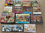 12 Are New Lot Of 16 Jigsaw Puzzles 1000 Pieces Colorful Nice Variety. Fixed Price $99.00.