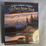 Reflective Art Inc. 550 Piece Jigsaw Puzzle Hayden Lambson Cabin Lake Mountain. Fixed Price $7.00.