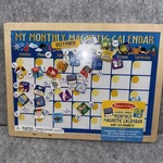 Melissa & Doug Monthly Magnetic Calendar Wood Hinged Folding 134 Magnets #3788. Fixed Price $21.24.