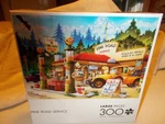 Buffalo Jigsaw Puzzle,"pine Road Service" 300 Large Pieces. Fixed Price $10.40.