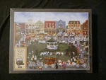 New Lang 500 Piece Puzzle Village Celebration Factory Sealed Jigsaw. Fixed Price $29.99.