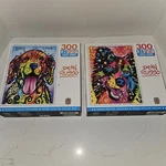 (2) Masterpieces Dean Russo Dog Is Love & Happy Boy! 300 Ez Grip Puzzle. Fixed Price $23.99.