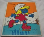 Vintage Playskool Smurfs Smurfette Ice Skating Wooden Frame Tray 10 Piece Puzzle. Fixed Price $20.00.