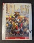 New York Puzzle Company - City Bear By Peter De Seve 1000PC Jigsaw. Fixed Price $29.99.