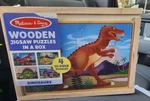 Melissa & Doug - Dinosaurs Wooden Jigsaw Puzzles 48 Pcs New Storage Box. Fixed Price $8.39.
