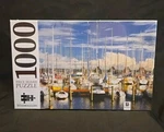 New And Sealed Mindbogglers 1000 Piece Jigsaw Puzzle Marina Boats. Fixed Price $19.92.