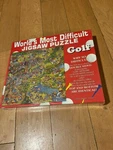 Sealed Buffalo Games World's Most Difficult Jigsaw Puzzle Golf Edition. Fixed Price $21.05.