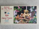 New Summer The Porch Sunsout 300 Piece Jigsaw Puzzle By Howard Robinson. Fixed Price $12.99.