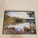 Cobble Hill Nature's Mirror 1000 Piece Jigsaw Puzzle Lake Canoe Scenic Poster. Fixed Price $24.99.