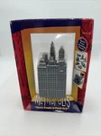 Metropolis Seven Piece Stacking Puzzle Game - 1998 Damert Nib Box Damage. Fixed Price $29.95.