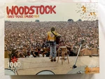 Aquarius Woodstock 3 Days Peace & Music 1969 1000 Piece Jigsaw Puzzle 20" X 27". Fixed Price $12.95.
