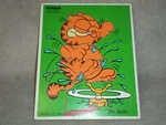 Playskool Garfield Wooden Puzzle Jim Davis Sprinkler Fun 1978 250-10 Piece. Fixed Price $9.95.